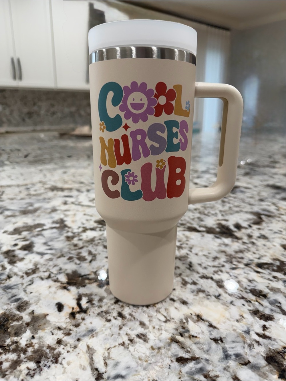 Cream "Cool Nurses Club" Insulated Travel Mug with Handle.